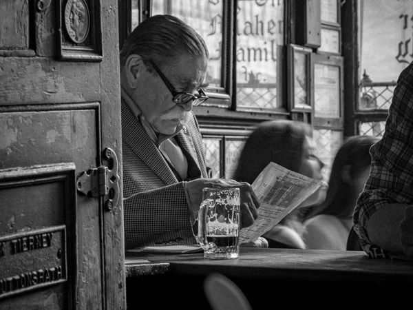 Man Reading Newspaper.